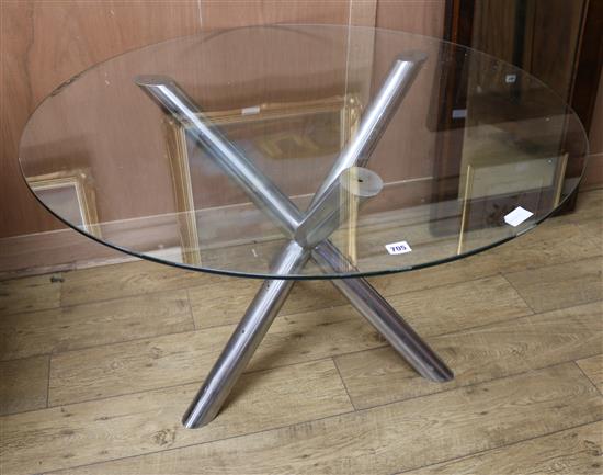 A chrome and glass circular dining table W.111cm